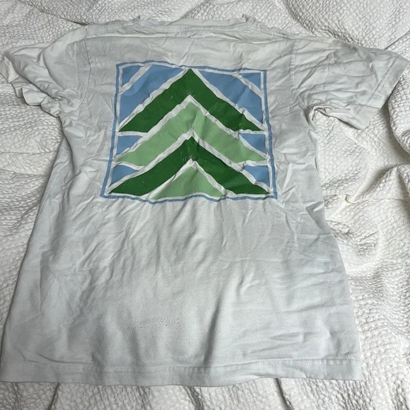 The brand is Russell and the size is small and is white with green and blue. - Picture 4 of 6
